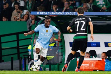 Jeremy Doku UEFA Şampiyonlar Ligi maçında Sporting CP ve Manchester City FC takımları arasında görüldü (Maciej Rogowski)