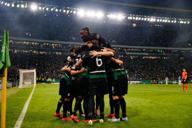 Spor Takımı, UEFA Şampiyonlar Ligi maçında attığı golün ardından Manchester City FC (Maciej Rogowski)