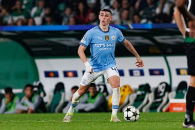 Phil Foden UEFA Şampiyonlar Ligi maçında Sporting CP ve Manchester City FC takımları arasında görüldü (Maciej Rogowski)