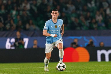 Phil Foden UEFA Şampiyonlar Ligi maçında Sporting CP ve Manchester City FC takımları arasında görüldü (Maciej Rogowski)