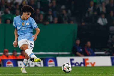 Rico Lewis UEFA Şampiyonlar Ligi maçında Sporting CP ve Manchester City FC takımları arasında görüldü (Maciej Rogowski)