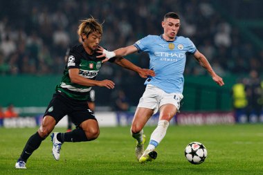 Hidemasa Morita, Phil Foden UEFA Şampiyonlar Ligi maçında Sporting CP ve Manchester City FC takımları arasında görüldü (Maciej Rogowski)