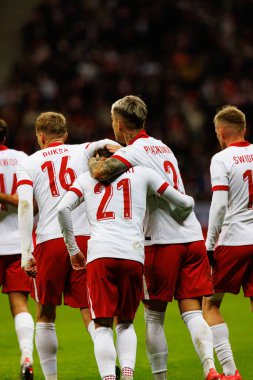 Nicola Zalewski ve Kamil Piatkowski, Polonya ve İskoçya milli takımları arasında oynanan UEFA Milletler Ligi maçında gol attıktan sonra PGE Narodowy 'da (Maciej Rogowski)