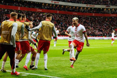 Kamil Piatkowski, Polonya ve İskoçya milli takımları arasında oynanan UEFA Milletler Ligi maçında gol attıktan sonra PGE Narodowy 'da (Maciej Rogowski)