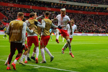 Kamil Piatkowski, Polonya ve İskoçya milli takımları arasında oynanan UEFA Milletler Ligi maçında gol attıktan sonra PGE Narodowy 'da (Maciej Rogowski)