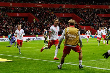 Kamil Piatkowski, Polonya ve İskoçya milli takımları arasında oynanan UEFA Uluslar Ligi maçında attığı golün ardından PGE Narodowy 'de (Maciej Rogowski)