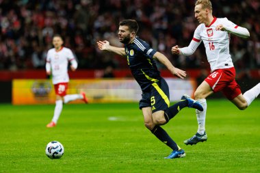 Grant Hanley, Adam Buksa UEFA Uluslar Ligi maçında PGE Narodowy 'de Polonya ve İskoçya milli takımları arasında görüldü (Maciej Rogowski)