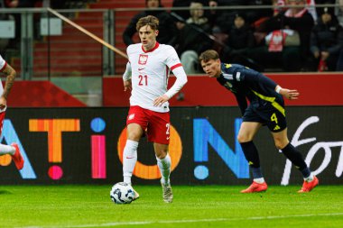 Nicola Zalewski, Scott McTominay UEFA Uluslar Ligi maçında Polonya ve İskoçya milli takımları arasında PGE Narodowy 'de görüldü (Maciej Rogowski)