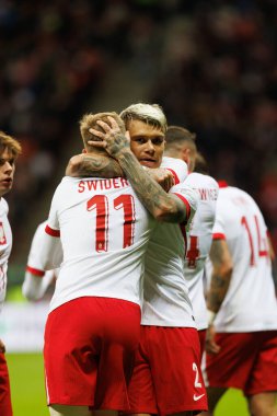 Karol Swiderski ve Kamil Piatkowski, Polonya ve İskoçya milli takımları arasında oynanan UEFA Milletler Ligi maçında gol attıktan sonra PGE Narodowy 'da (Maciej Rogowski)