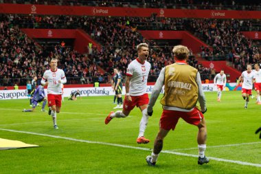 Kamil Piatkowski, Polonya ve İskoçya milli takımları arasında oynanan UEFA Milletler Ligi maçında gol attıktan sonra PGE Narodowy 'da (Maciej Rogowski)