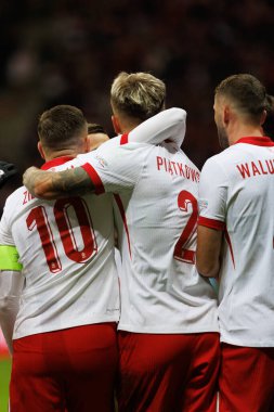 Piotr Zielinski ve Kamil Piatkowski, Polonya ve İskoçya milli takımları arasında oynanan UEFA Milletler Ligi maçında gol attıktan sonra PGE Narodowy 'de (Maciej Rogowski)