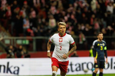 Kamil Piatkowski, Polonya ve İskoçya milli takımları arasında oynanan UEFA Milletler Ligi maçında gol attıktan sonra PGE Narodowy 'da (Maciej Rogowski)