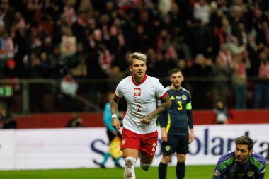 Kamil Piatkowski, Polonya ve İskoçya milli takımları arasında oynanan UEFA Milletler Ligi maçında gol attıktan sonra PGE Narodowy 'da (Maciej Rogowski)