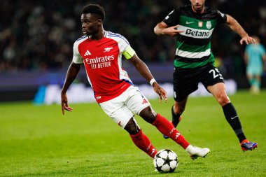 Bukayo Saka, Goncalo Inacio UEFA Şampiyonlar Ligi maçında Sporting CP ve Arsenal FC (Maciej Rogowski) 