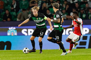 Morten Hjulmand, Maximiliano Araujo UEFA Şampiyonlar Ligi maçında CP ve Arsenal FC takımları arasında görüldü (Maciej Rogowski) 