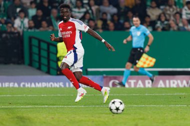 Bukayo Saka UEFA Şampiyonlar Ligi maçında Sporting CP ve Arsenal FC takımları arasında görüldü (Maciej Rogowski) 