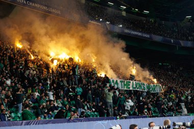 UEFA Şampiyonlar Ligi maçında Sporting taraftarları CP ve Arsenal FC (Maciej Rogowski) 