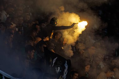 UEFA Şampiyonlar Ligi maçında Sporting taraftarları CP ve Arsenal FC (Maciej Rogowski) 