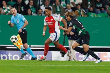 Jurrien Timber, Hidemasa Morita UEFA Şampiyonlar Ligi maçında Sporting CP ve Arsenal FC takımları arasında görüldü (Maciej Rogowski) 