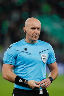 Szymon Marciniak UEFA Şampiyonlar Ligi maçında Sporting CP ve Arsenal FC takımları arasında görüldü (Maciej Rogowski) 