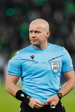 Szymon Marciniak UEFA Şampiyonlar Ligi maçında Sporting CP ve Arsenal FC takımları arasında görüldü (Maciej Rogowski) 