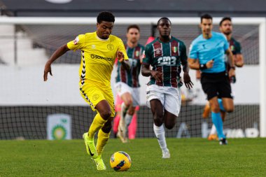 Nigel Thomas, Liga Portekiz maçı sırasında Estrela Amadora ve CD Nacional takımları arasında Estadio Jose Gomes 'de (Maciej Rogowski)