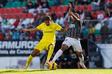 Matheus Dias, Leo Cordeiro Liga Portekiz maçı sırasında Estrela Amadora ve CD Nacional takımları arasında Estadio Jose Gomes (Maciej Rogowski)