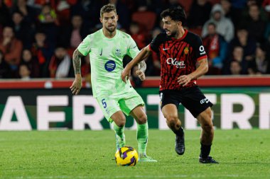Inigo Martinez, Manu Morlane LaLiga EA SPORTS maçı sırasında RCD Mallorca ve FC Barcelona (Maciej Rogowski)