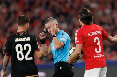 Kacper Urbanski, Radu Marian Petrescu, Alvaro Carreras UEFA Şampiyonlar Ligi maçında SL Benfica ve Bologna FC 1909 takımları arasında görüldü (Maciej Rogowski)