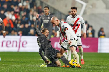 Luka Modric, Isi Palazon seen during LaLiga EA SPORTS game between teams of Rayo Vallecano and Real Madrid FC at Estadio de Vallecas (Maciej Rogowski) clipart