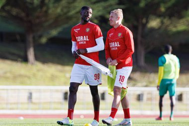 Ibrahima Guirassy ve Vladan Daniloviç, Liga Portekiz 2 maçında CD Mafra ve CS Maritimo (Maciej Rogowski) takımları arasında görüldü.)