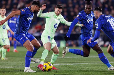 Omar Alderete, Robert Lewandowski, Cristantus Uche LaLiga EA Spor Maçı sırasında Estadio Kolezyumu 'nda Getafe CF ve FC Barcelona takımları arasında görüldü (Maciej Rogowski)