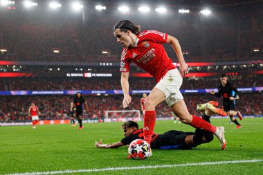 Lamine Yamal, Alvaro Carreras UEFA Şampiyonlar Ligi maçında SL Benfica ve FC Barcelona (Maciej Rogowski) takımları arasında görüldü.)