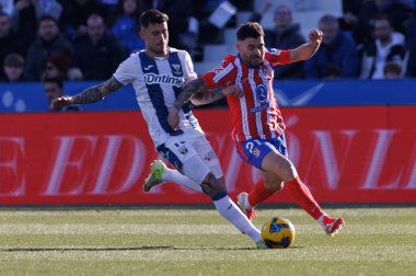 Dani Raba, Javi Galan seen during LaLiga EA SPORTS game between teams of CD Leganes and Atletico de Madrid at Estadio Municipal de Butarque (Maciej Rogowski) clipart