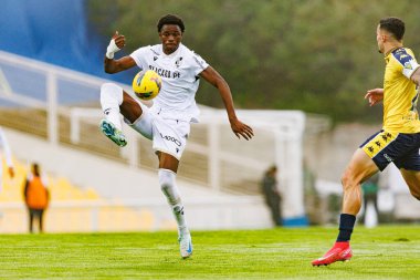 Dieu-Merci Michel, Liga Portekiz maçı sırasında Estoril Praia ve Vitoria SC takımları arasında Estadio Antonio Coimbra da Mota 'da görüldü (Maciej Rogowski)