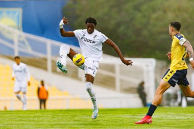 Dieu-Merci Michel, Liga Portekiz maçı sırasında Estoril Praia ve Vitoria SC takımları arasında Estadio Antonio Coimbra da Mota 'da görüldü (Maciej Rogowski)