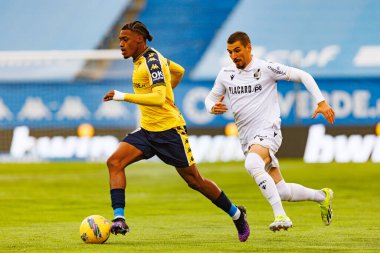Joao Mendes ve Wagner Pina Liga Portekiz maçı sırasında Estoril Praia ve Vitoria SC takımları arasında Estadio Antonio Coimbra da Mota (Maciej Rogowski)