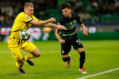 Julian Ryerson ve Gabriel Teixeira Aragao Biel, UEFA Şampiyonlar Ligi maçında Sporting CP ve Borussia Dortmund (Maciej Rogowski)