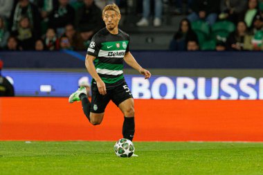 Hidemasa Morita UEFA Şampiyonlar Ligi maçında Sporting CP ve Borussia Dortmund (Maciej Rogowski) takımları arasında görüldü.)
