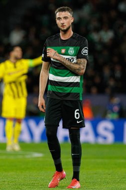 Zeno Debast seen during UEFA Champions League game between teams of Sporting CP and Borussia Dortmund (Maciej Rogowski) clipart