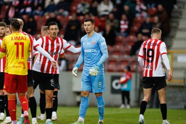 Patryk Sokolowski ve Sebastian Madejski, PKO BP Ekstraklasa maçında Krakovia ve Jagiellonia Bialystok takımları arasında Stadion Cracovii im 'de görüldüler. Jozefa Pilsudskiego (Maciej Rogowski)