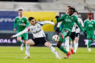 Ruben Vinagre ve Abdoul Tapsoba, PKO BP Ekstraklasa maçında Radomiak Radom ve Legia Warszawa takımları arasında Stadion Miejski im 'de görüldü. Braci Czachorow (Maciej Rogowski)