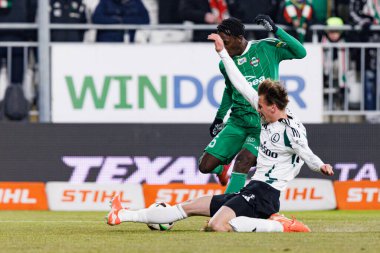Abdoul Tapsoba ve Jan Ziolkowski, PKO BP Ekstraklasa maçında Radomiak Radom ve Legia Warszawa takımları arasında Stadion Miejski im 'de görüldü. Braci Czachorow (Maciej Rogowski)