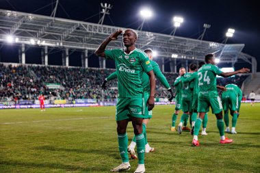 Capita Osvaldo Pedro Capemba, Stadyum 'daki Radomiak Radom ve Legia Warszawa takımları arasında oynanan PKO BP Ekstraklasa maçında gol attıktan sonra kutlama yaparken görüldü. Braci Czachorow (Maciej Rogowski)