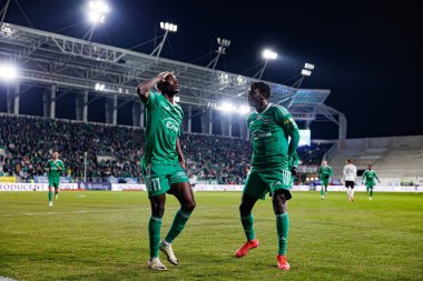 Capita Osvaldo Pedro Capemba ve Abdoul Tapsoba, Stadyum Miejski im 'de Radomiak Radom ve Legia Warszawa takımları arasında oynanan PKO BP Ekstraklasa maçında gol attıktan sonra kutlama yaparken görüldü. Braci Czachorow (Maciej Rogowski)