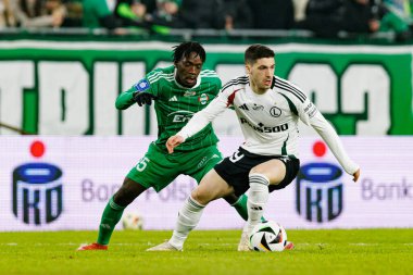 Abdoul Tapsoba ve Ruben Vinagre, PKO BP Ekstraklasa maçında Radomiak Radom ve Legia Warszawa takımları arasında Stadion Miejski im 'de görüldü. Braci Czachorow (Maciej Rogowski)