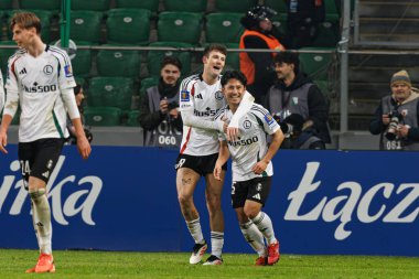 Marc Gual ve Ryoya Morishita, Stadyum Miejski Legii Warszawa 'daki Legia Warszawa ve Jagiellonia Bialystok takımları arasındaki Puchar Polski maçında gol attıktan sonra kutlama yaparken görüldü. Jozefa Pilsudskiego (Maciej Rogowski)