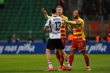 Pawel Wszolek, Mateusz Skrzypczak ve Enzo Ebosse, Puchar Polski maçında Stadion Miejski Legii Warszawa 'daki Legia Warszawa ve Jagiellonia Bialystok takımları arasında görüldü. Jozefa Pilsudskiego (Maciej Rogowski)