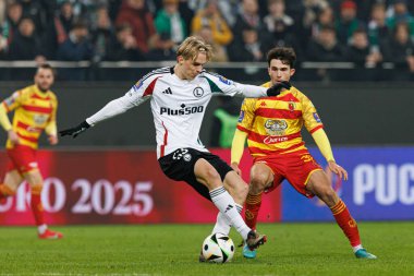 Wojciech Urbanski ve Leon Flach, Puchar Polski maçında Stadion Miejski Legii Warszawa 'daki Legia Warszawa ve Jagiellonia Bialystok takımları arasında görüldü. Jozefa Pilsudskiego (Maciej Rogowski)