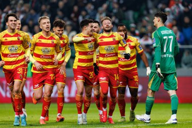 Jagiellonia oyuncuları, Puchar Polski maçında Stadion Miejski Legii Warszawa 'da Legia Warszawa ve Jagiellonia Bialystok takımları arasında Jaroslaw Kubicki' den gol üstüne gol atarken görüldü. Jozefa Pilsudskiego (Maciej Rogowski)